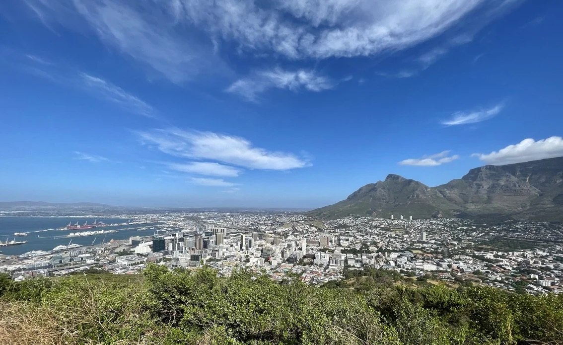  Seen from atop Signal Hill, downtown Cape Town.    The three cylindrical towers under Table Mountain were an anathema to the folks of Capetown.  A series of them were planned but protests put an end to that.  Many would like to see them removed.  