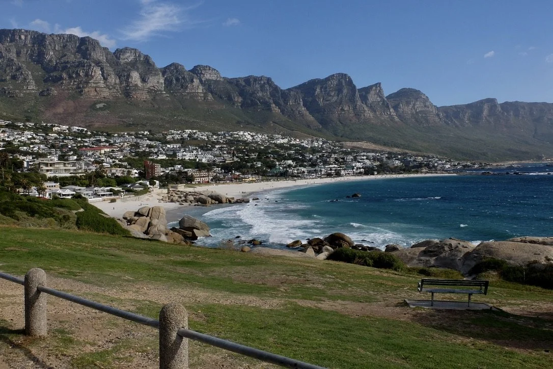  Now driving down &amp; around Cape Town at sea level we encountered Clifton &amp; Clifton Bay. It was so windy here that Nomi had to steady my body so I could take this photograph. 