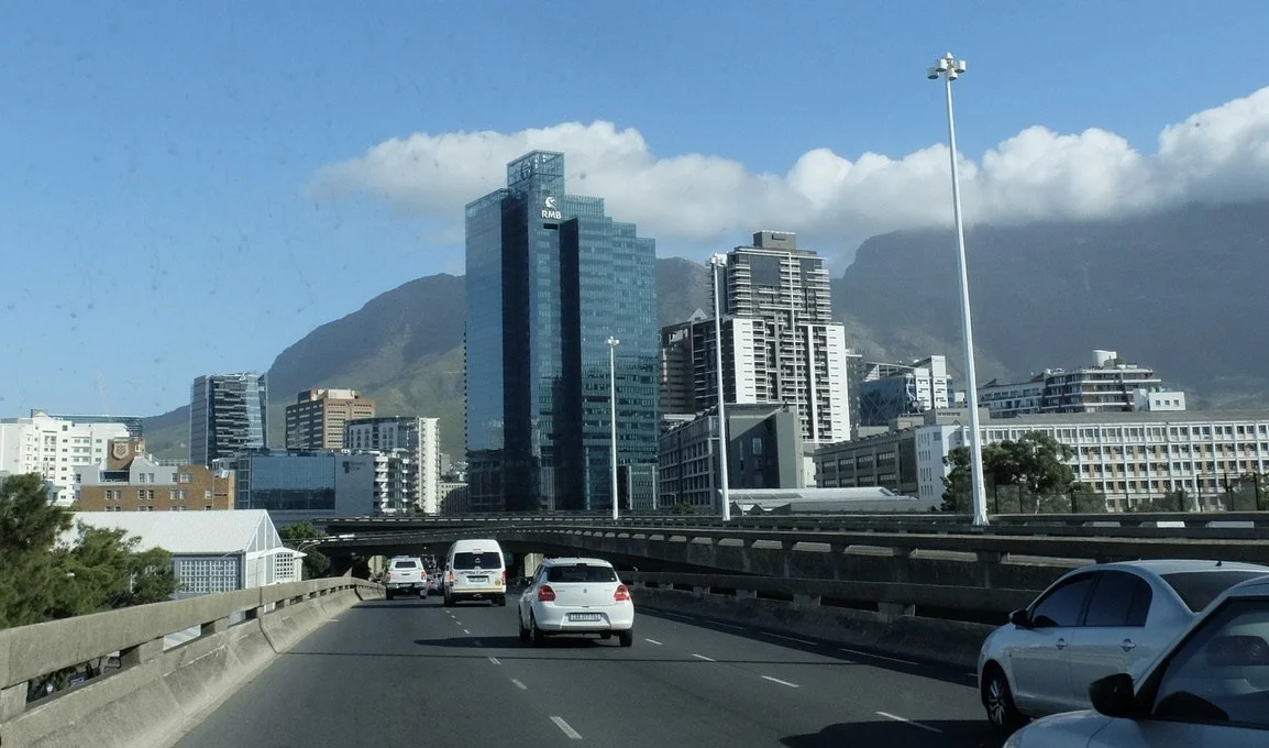  Approaching downtown Cape Town with fog covered Table Mountain to the right. 