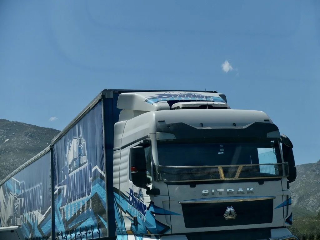  Me &amp; my trucks…  “SINOTRUK is a high-end brand of trucks …, a collaboration between SINOTRUK and a German company. Sinotruk,  has  vehicle and component factories in eight provinces across China. Our facilities include Asia's longest vehicle ass