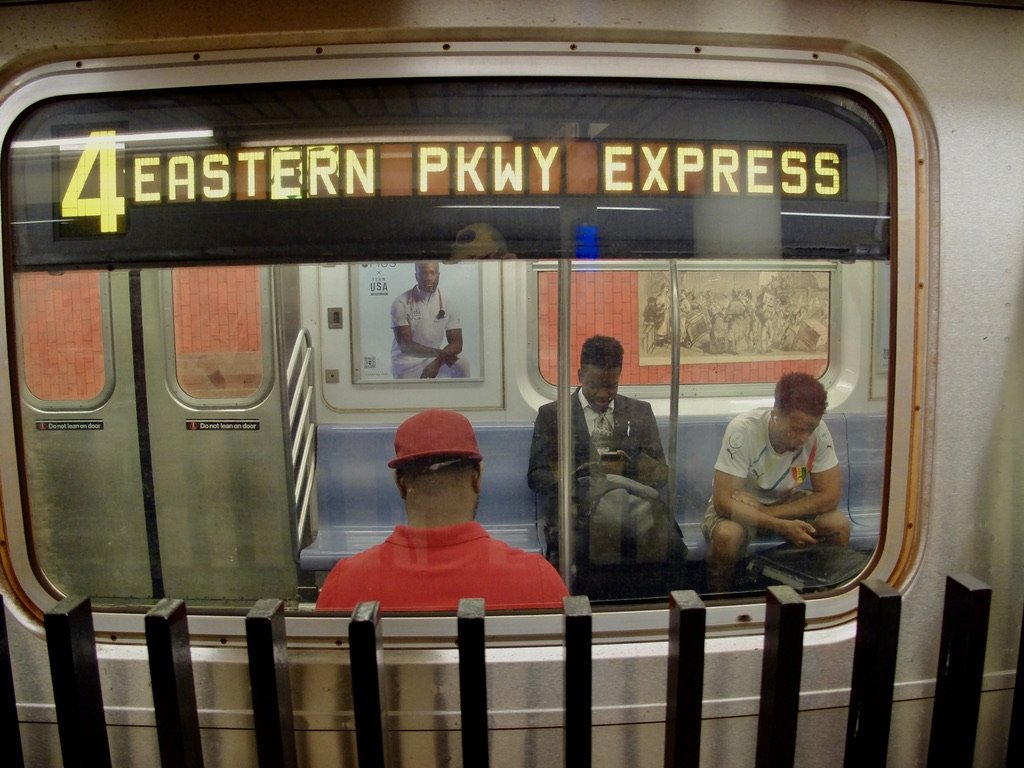  “Going to Work” from one of my previous blogs on workers like:    Workers I- "I'm taking what they giving 'cause I'm working for a livin'." by Huey Lewis and the News     Subway photography is challenging. Luckily when I noticed the red centered guy