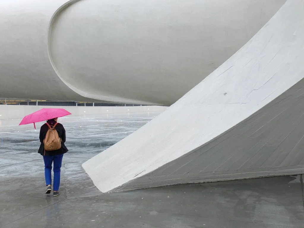  The diagonal leading into the pink umbrella was what made me capture this exposure at the TWA Terminal Hotel at JFK. FujiFilm X30. 
