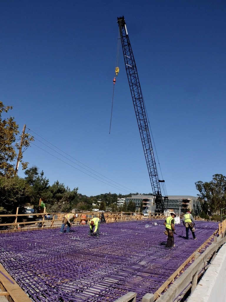  “Purple rebar, specifically Sher-Bar ™  Purple, is a type of epoxy-coated reinforcing steel used in bridge construction to enhance corrosion resistance.”  Bon Air Bridge Replacement Project, Larkspur, CA. 