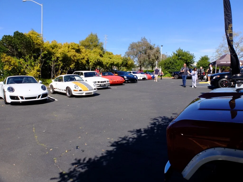 CLUB WHEELHOUSE TURNS ONE Anniversary Open House 5842 Paradise Drive, Corte Madera.  I parked our 2012 MINI roadster at the far end of this lot.  The MINI was a bit outclassed. 