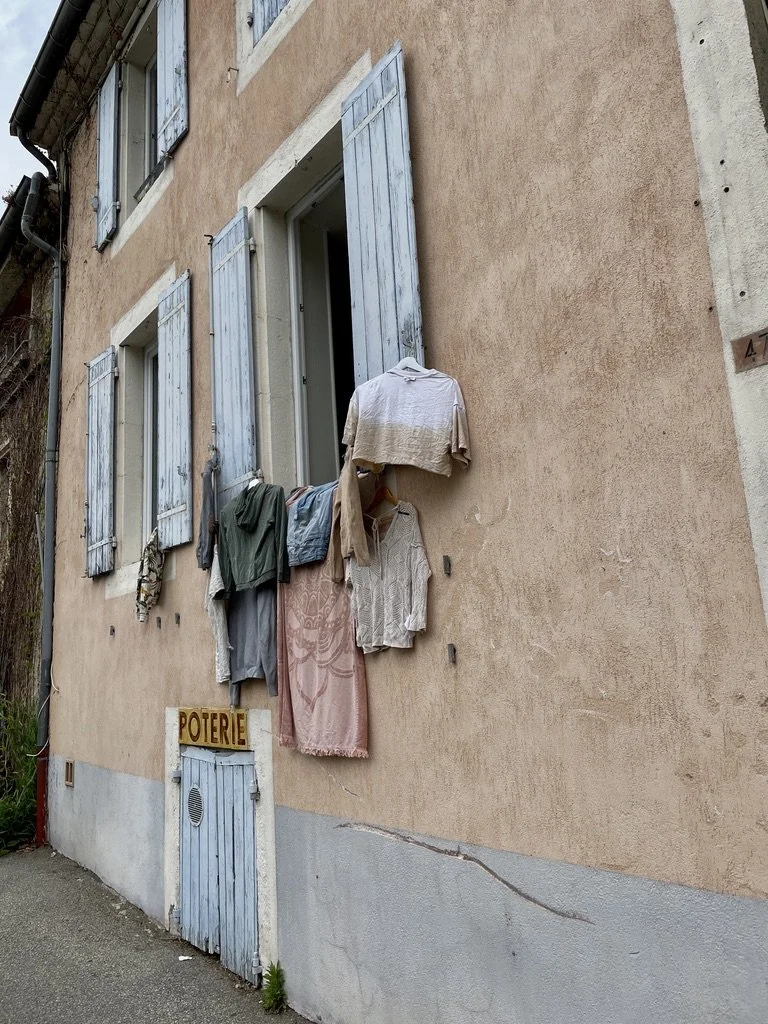  Dieulefit en Drôme Provençale, France.  April 2023.  This was a costly photo of good looking laundry.  I lost my balance walking backwards off a curb &amp; broke my FujuX30 &amp; lost a pair of sunglasses.    I hope you like the picture. 