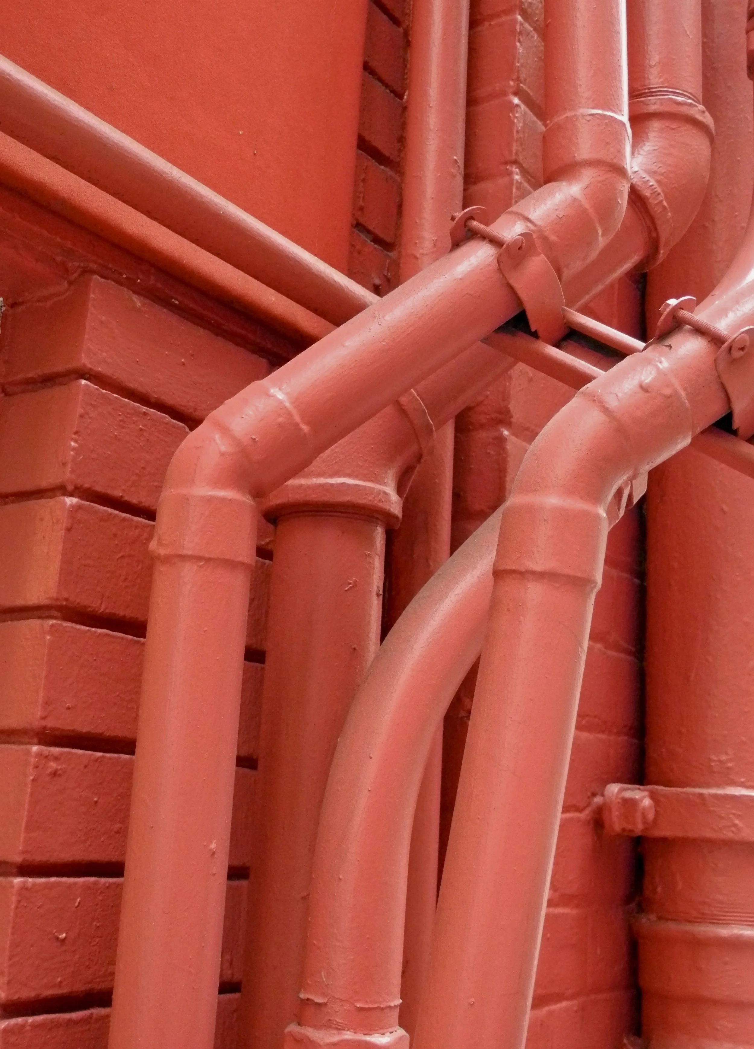  One of these has got to be a drainpipe!  Downtown San Francisco, CA. 