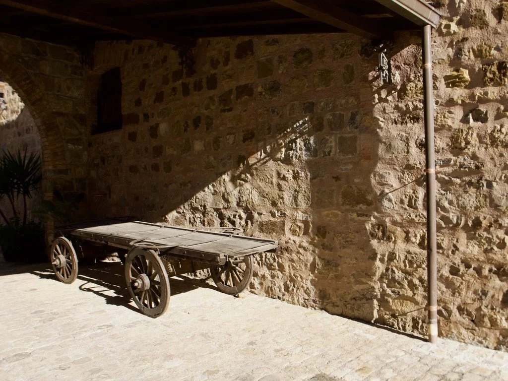  At a hotel entrance drive, a submerged drainpipe to keep the feet of guests dry.   Abbazia Santa Anastasia, Castelbuono, Sicily.  