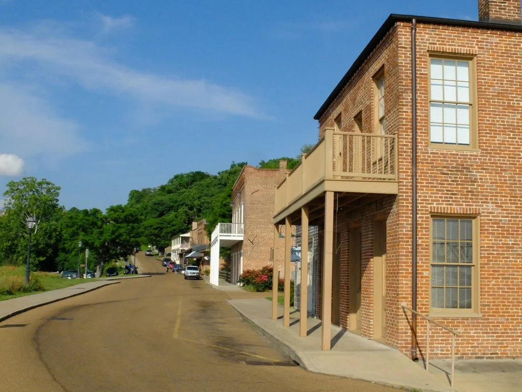  Directly down an old building in Natchez, Mississippi.  Jerry Lee Lewis started out in the bar in this building. 