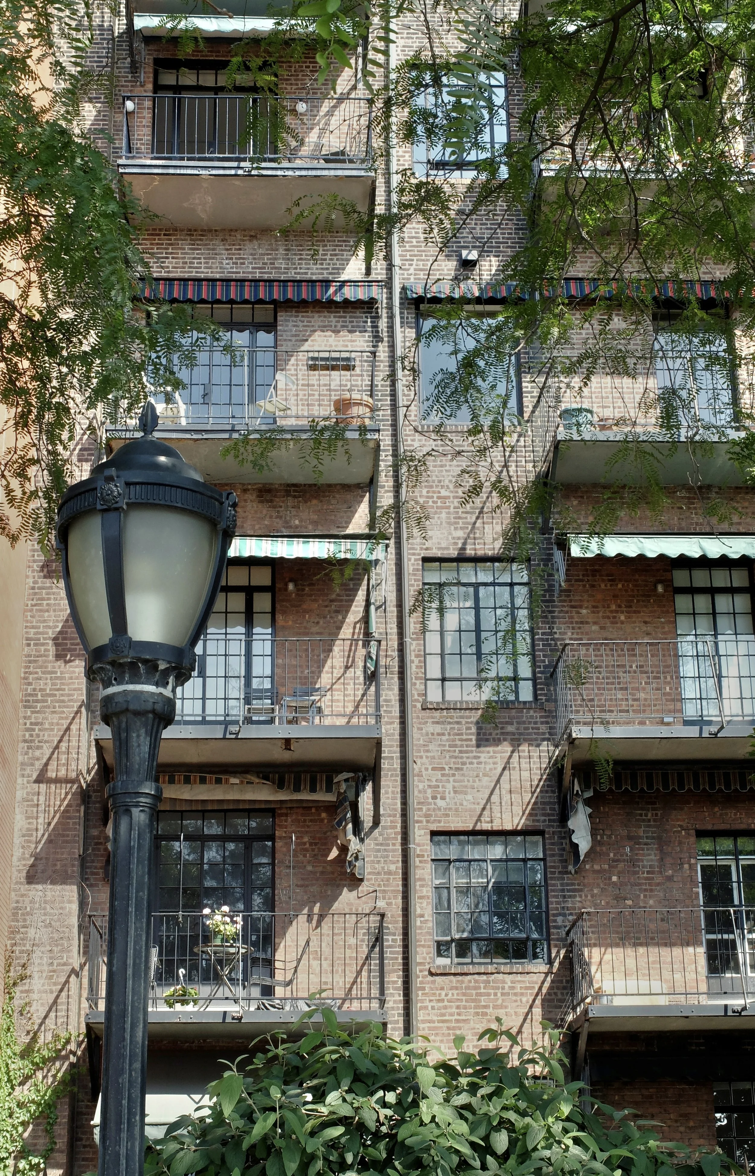  The folks in this Brooklyn Heights brick building I am sure don’t hear the water coming down this drain.  Brookyn, NY. 