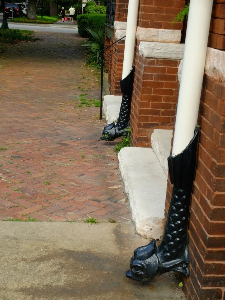  As they say farther north in Minnesota, “Fer cute!”  But your shoes can still get wet if you don’t exit carefully during a downpour.  Savannah, Georgia. 