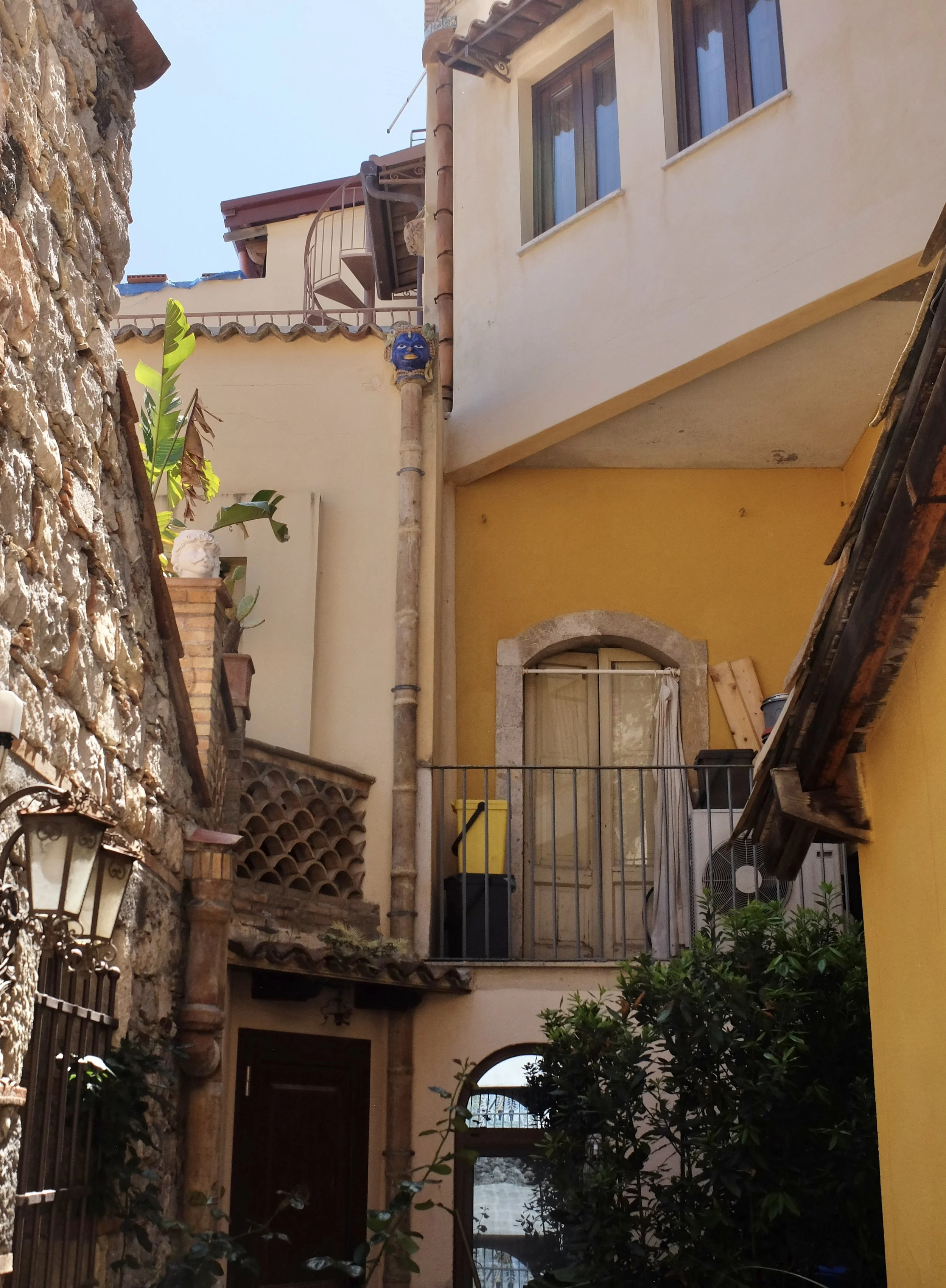  Very cute terra cotta work in Taormina, Sicily, Italy.  Look carefully. 