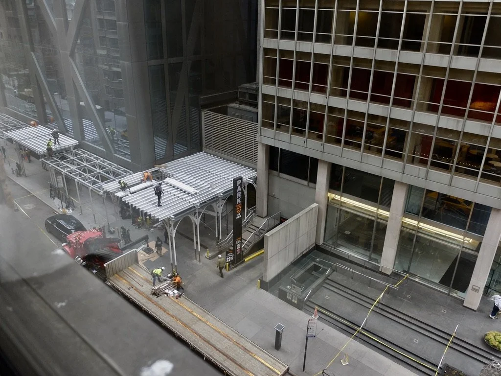  From our bedroom window at the Warwick Hotel.  This building is recent.  I wonder what work it needs so soon since its completion?   