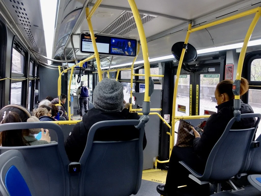  And we took a NY Transit M1 bus down Fifth Avenue. Incoming passengers were so delighted to discover that the Touch Screen to collect fares was out of order.  Lots of smiling. 