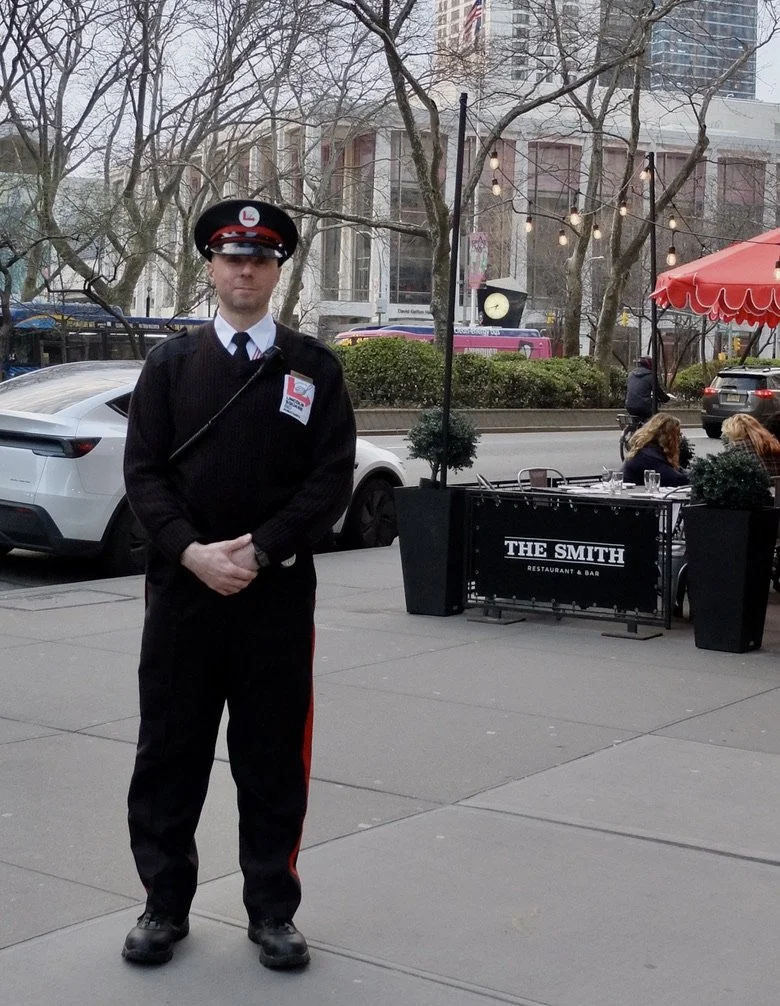  A Lincoln Square Business Improvement District public safety officer.  He liked his job.  He sounded Russian. 