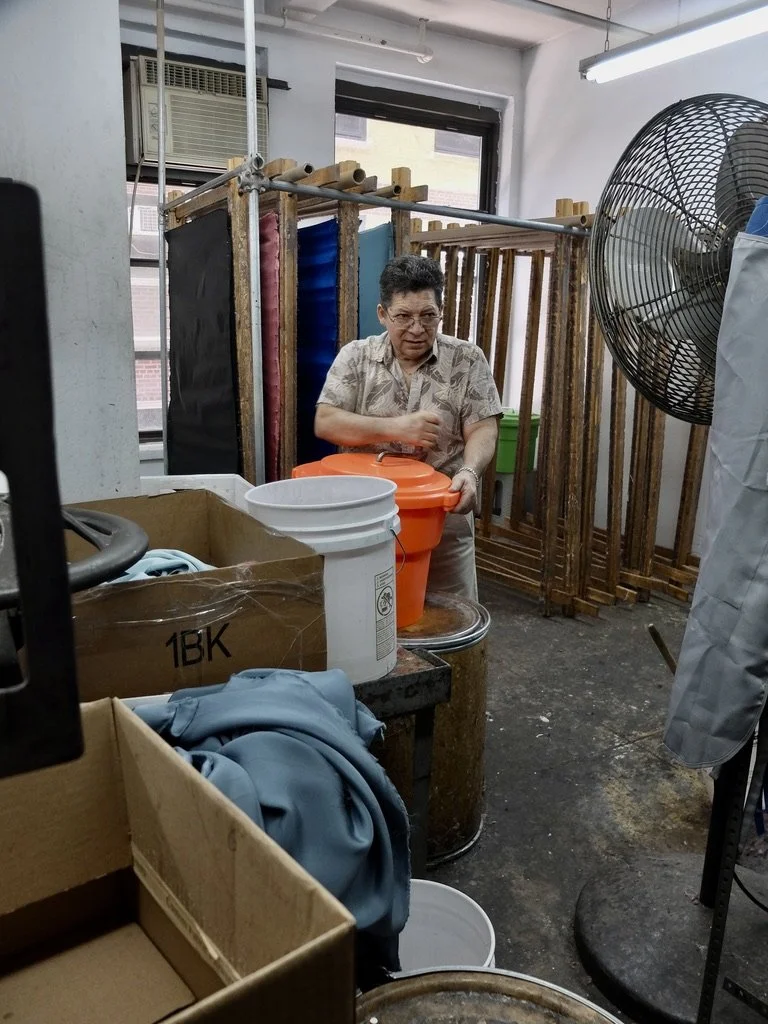  He wet &amp; starched the fabrics then set them to dry on those ancient racks.  M &amp; S Schmalberg Custom Fabric Flowers.  