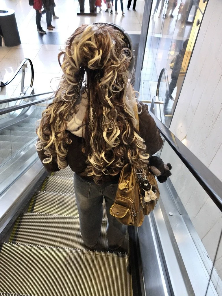  Making an entrance into the lobby of the TIME WARNER CENTER.  Even the teddy is well dressed. 