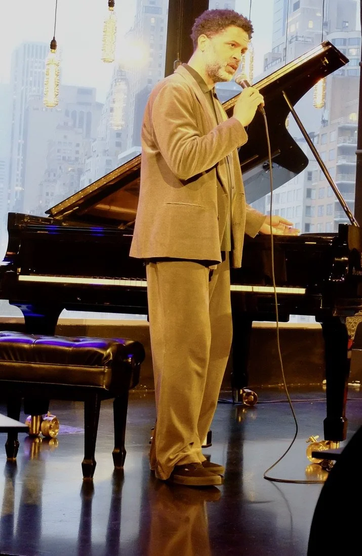  Jason Moran jazz pianist introducing the program then playing several piano pieces.  "A Centennial Piano Tribute to Randy Weston" at Dizzy's Club in the Time Warner building on Columbus Circle. 