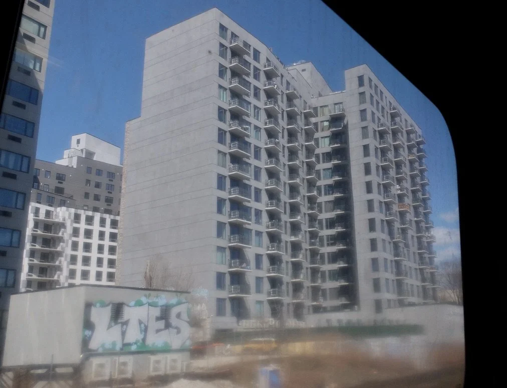  Through the dirty windows of the Metro North. 