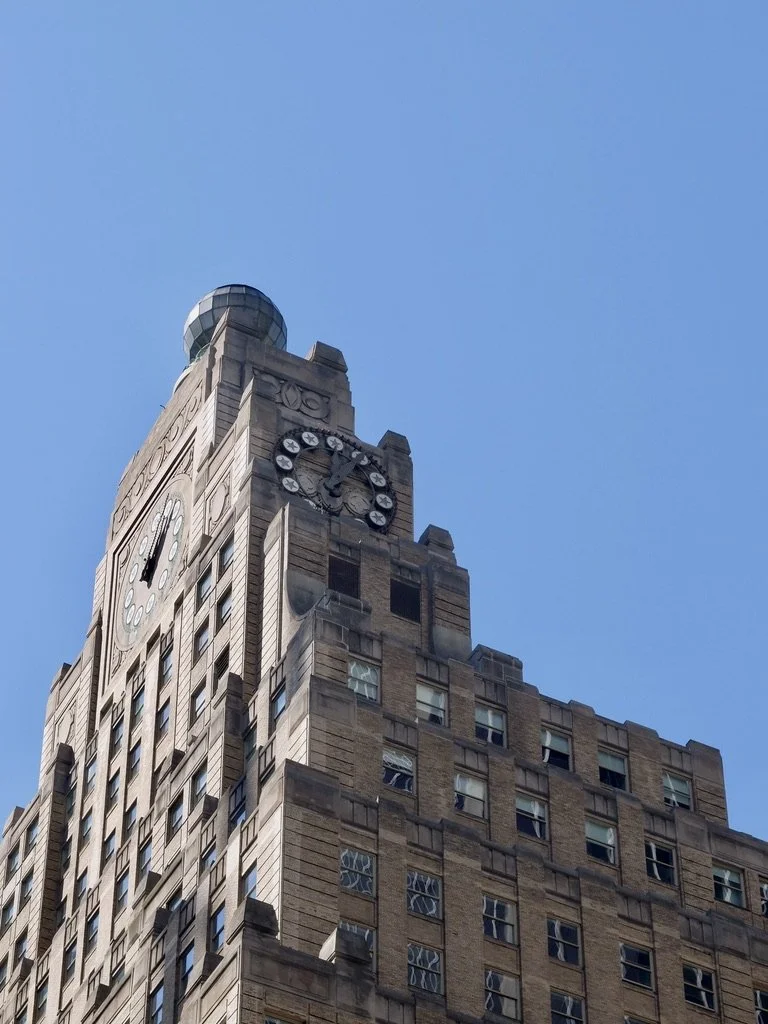  Paramount Bldg. Completed in 1927,  it was the tallest building in Times Square.   The four faced clock “…the hours denoted by five-pointed stars (forming a circle of stars as used in the Paramount Pictures logo)…”   “The  Paramount Building is offe