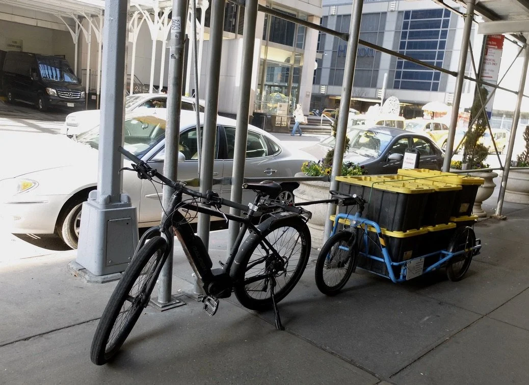  This is quite a set-up.  I first saw smaller versions of rigs like this in 2007 in Ashland, Oregon.  The bikes were not electric then. 