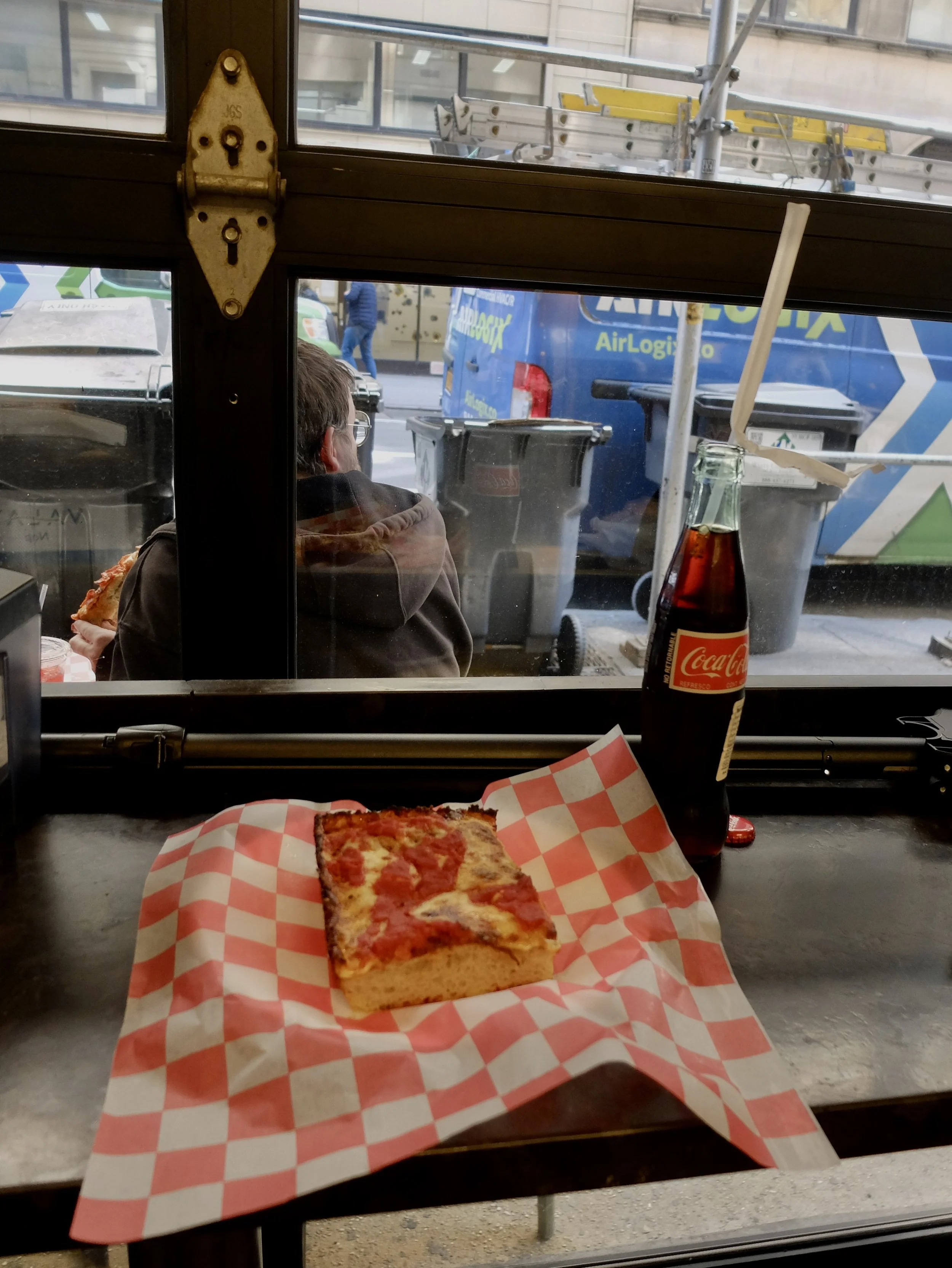  “SIciiian &amp; A Coke” - Nomi spotted the pizza sign &amp; we were ready for a snack &amp; sit down.  Upside Pizza 42nd St. 