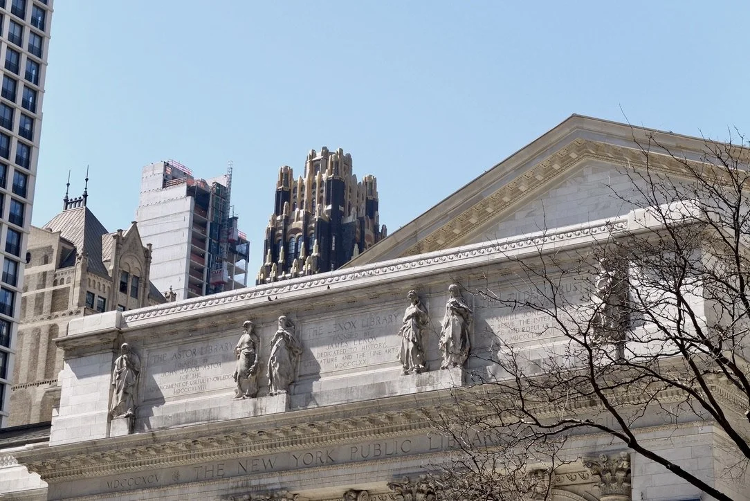  Roof façade of 42nd St. Public Library. Peeking out from behind is the roof of the Gothic &amp; Art Deco, black &amp; gold, AMERICAN-STANDARD (RADIATOR) BUILDING. 