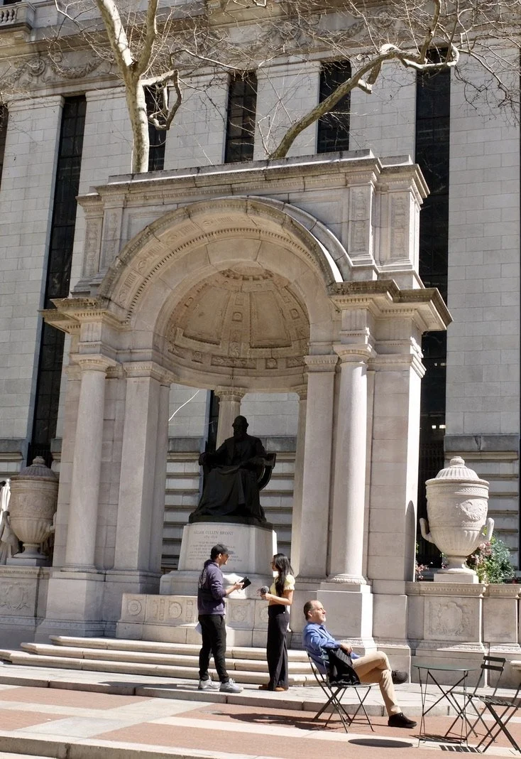  The "backyard" of the 42nd St. Public Library - "The William Cullen Bryant Memorial…located at Bryant Park in Manhattan. ...The statue of William Cullen Bryant was one of the statues of ‘Eminent Americans’ that surrounded the Palace of Fine Arts at 