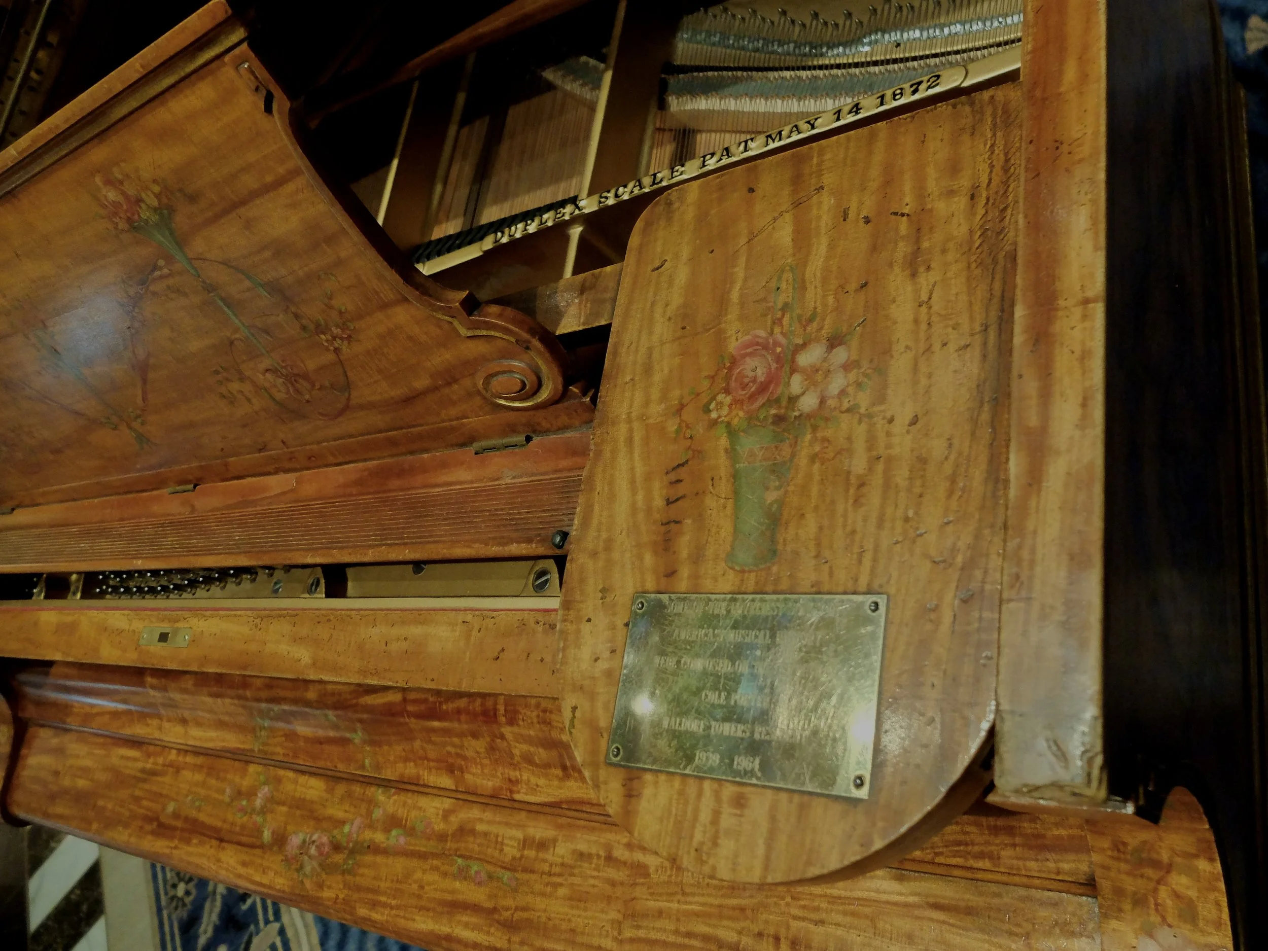  Waldorf Astoria Hotel  lobby. Cole Porter’s 1907 piano, “…which he himself named 'High Society',...This is the instrument on which Porter wrote many of his most popular songs."  Porter lived in the hotel for almost 30 years.  Subsequently Frank Sina