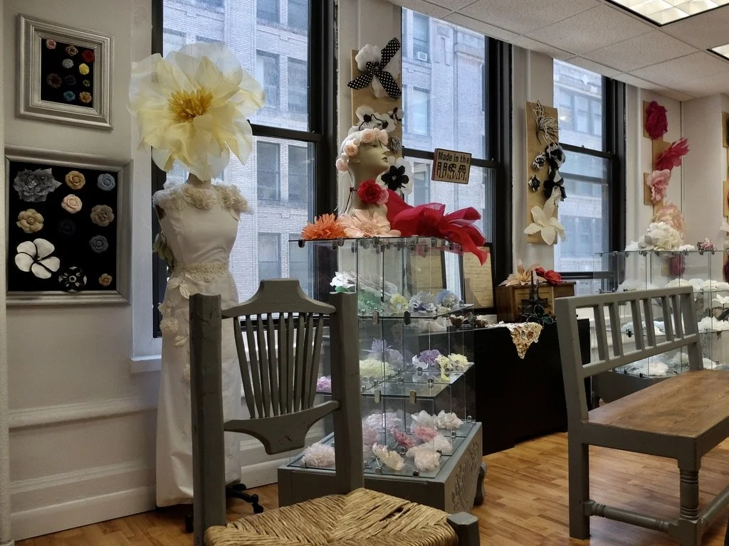  M &amp; S Schmalberg Custom Fabric Flowers.   https:customfabricflowers.com  “The 110-year old family business is the the last remaining flower factory of its kind in America. Founded in 1916 by Morris and Sam Schmalberg, and then run by Harold Schm