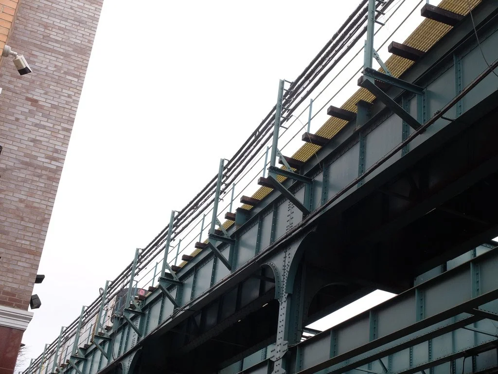 The Noble Sign Company is right below this L train on the El.   