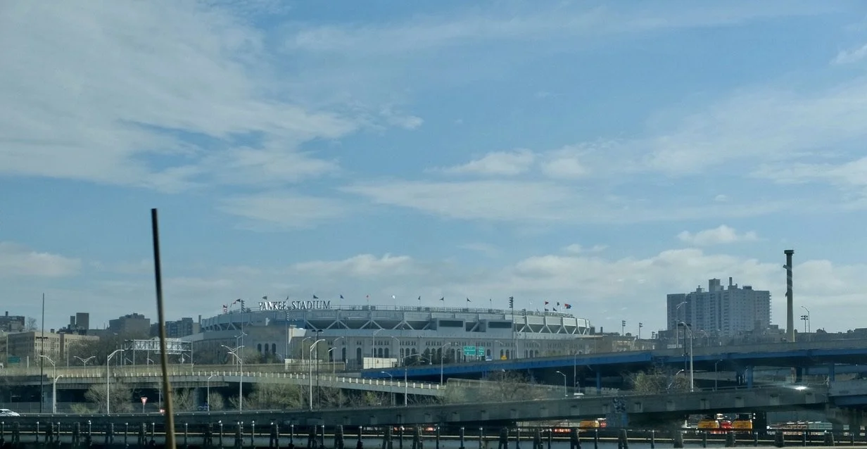  Yankee Stadium.   Driving up the Harlem River Drive. 