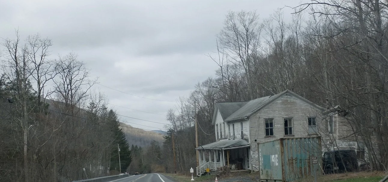  Dilapidated house along Rte. 214. 