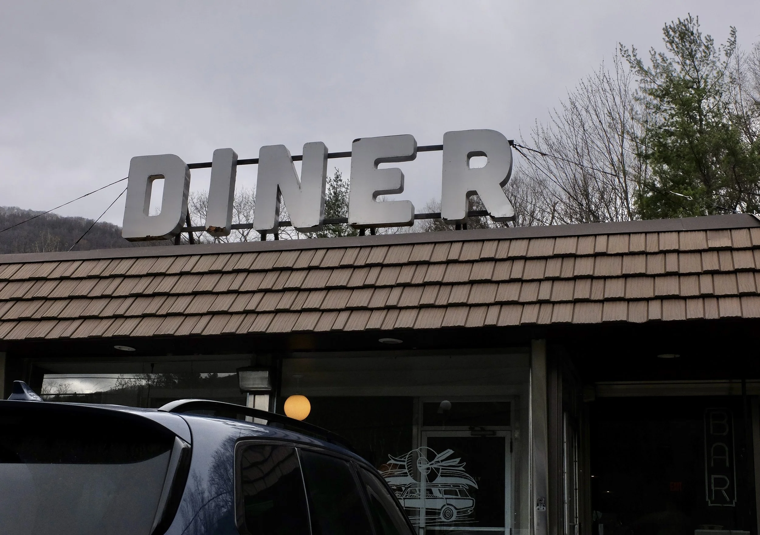  “DINER”   Phoenicia Diner, Rte. 28, Phoencia, NY   Once again a sign that demonstrates that wood rots. 