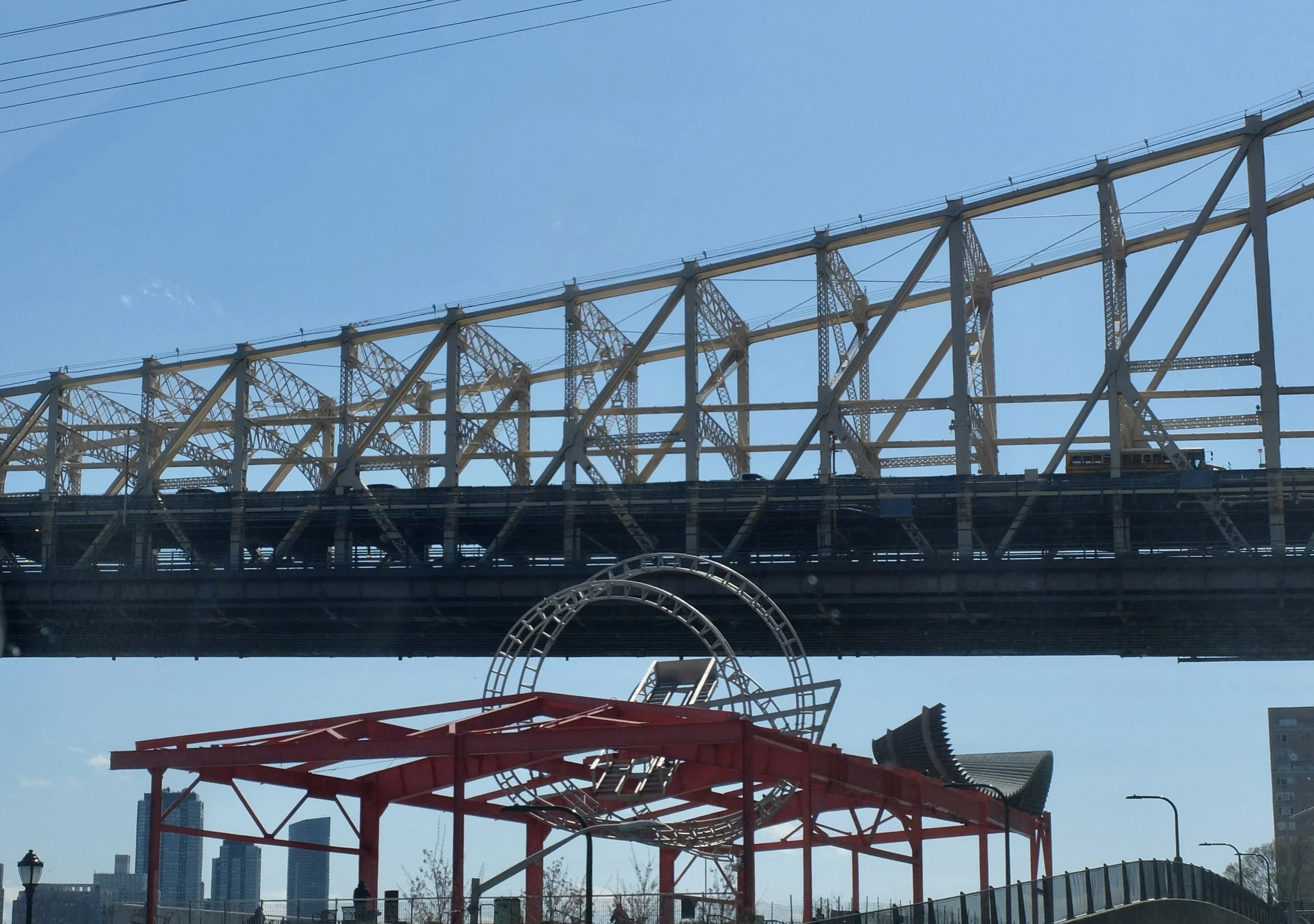  59th St. - Ed Koch - Queensboro Bridge - Along the FDR Drive. - “Red Sculpture East River Roundabout” c. 1995.  This took me a long time to figure out what it was.  “This 80-foot long aluminum helix is by artist Alice Aycock (b.1946)…. the highly vi
