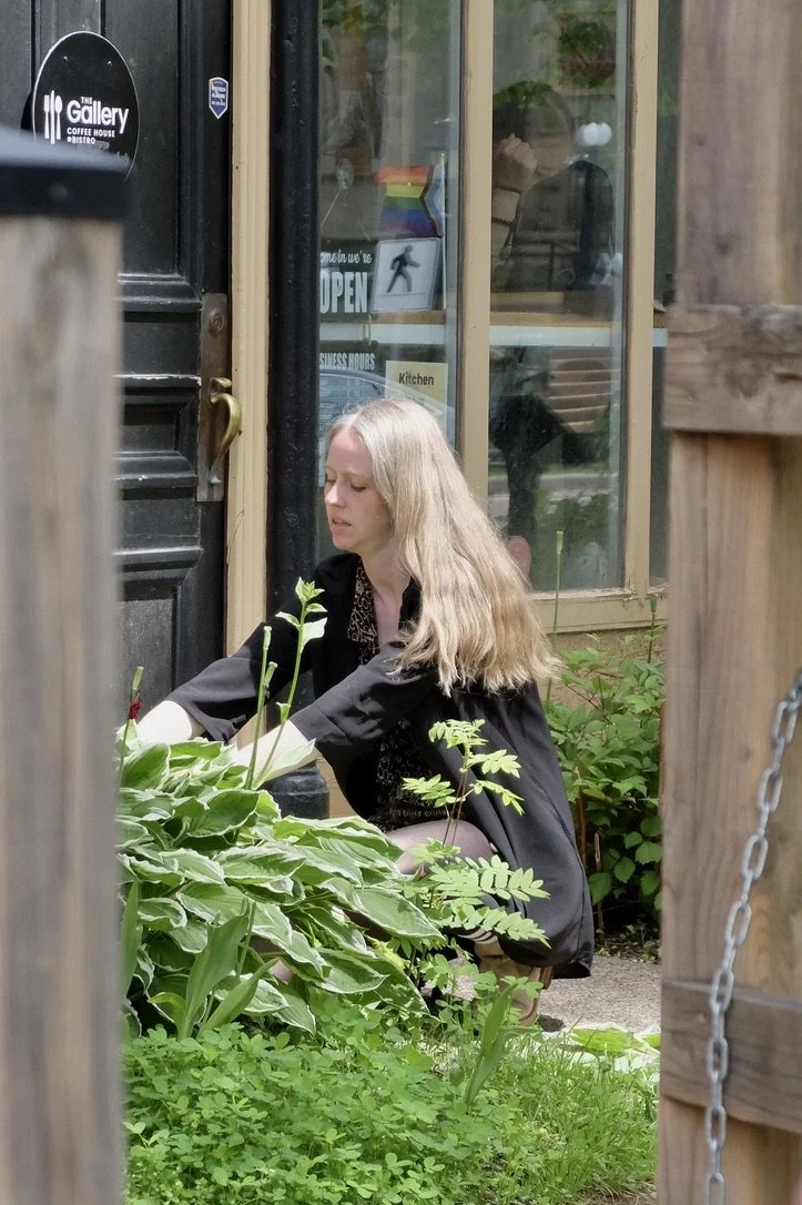  She was selecting leaves for some project.  I didn’t inquire.  The Gallery Coffee House &amp; Bistro on Great George Street, Historic District a National Historic Site of Canada,  Charlottetown, PEI 