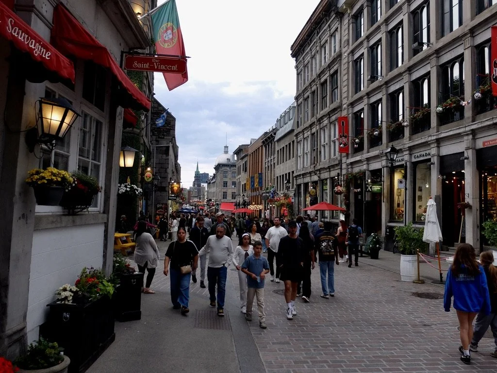  Italian passeggiata Canadian style.  The Portuguese restaurant we had just eaten at is to the left. (different name on the awning…?) 