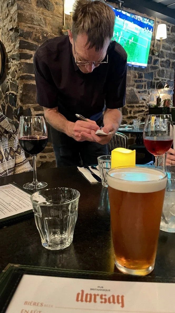  A congenial waiter in a British pub in Québec City that we had ducked into during a pouring rain.  