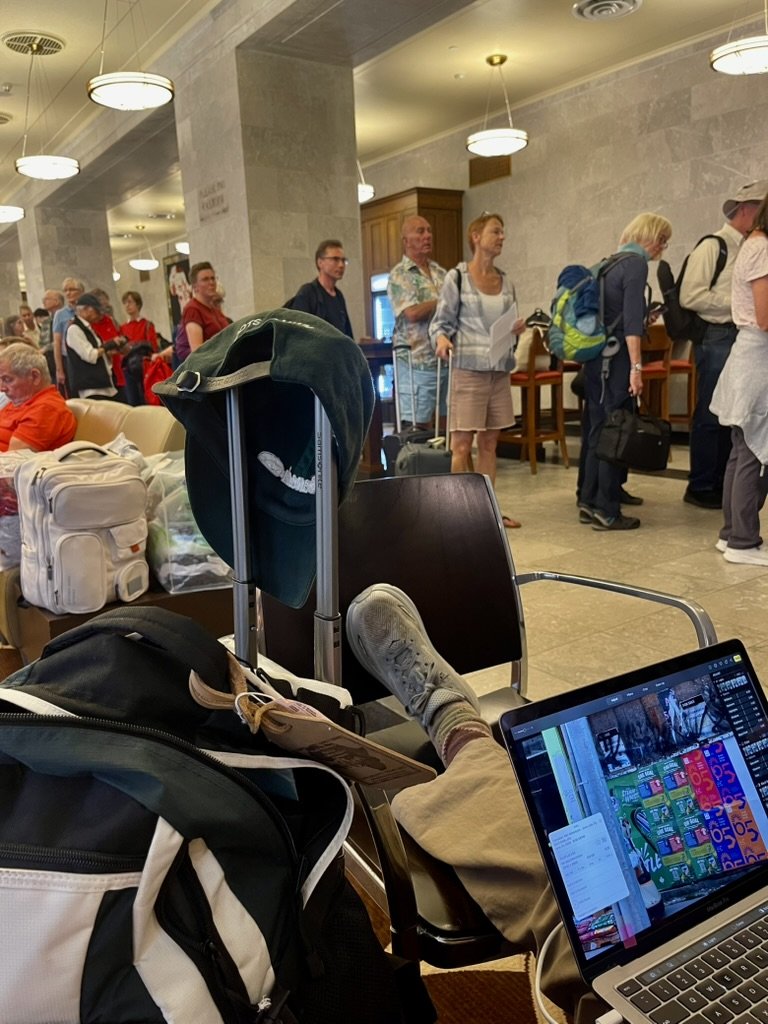  In  Toronto Union Station | VIA Rail ,   people waiting for dining time  assignments on our ten hour delayed sleeper train to Jasper.  There was no announcement about this.  The line suddenly appeared.  This presaged the rail line’s poor communicati