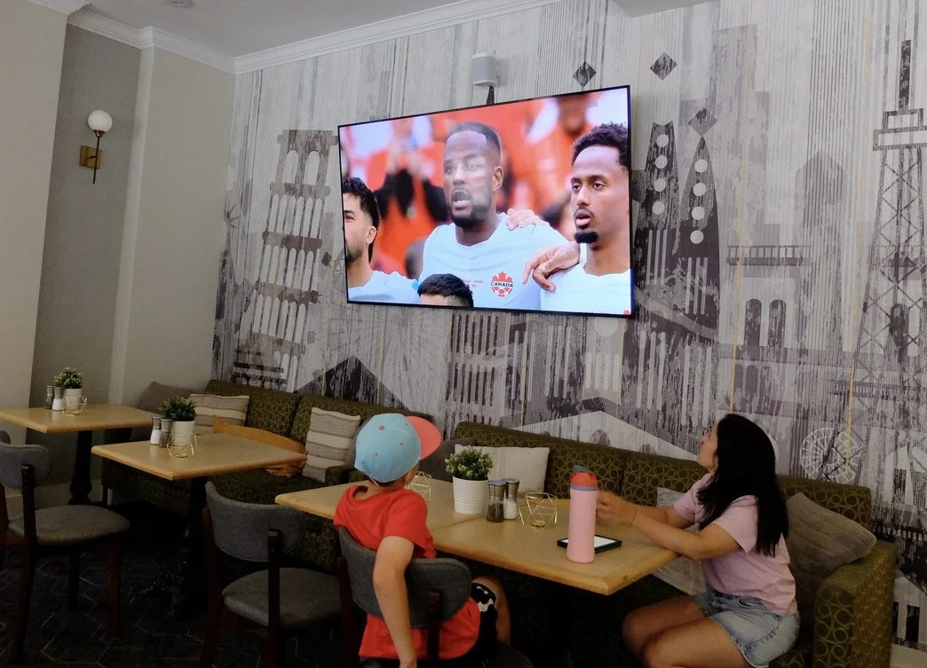   Hotel Novotel Centre Hotel Toronto  watching Canada vs. Switzerland FIFA game.    