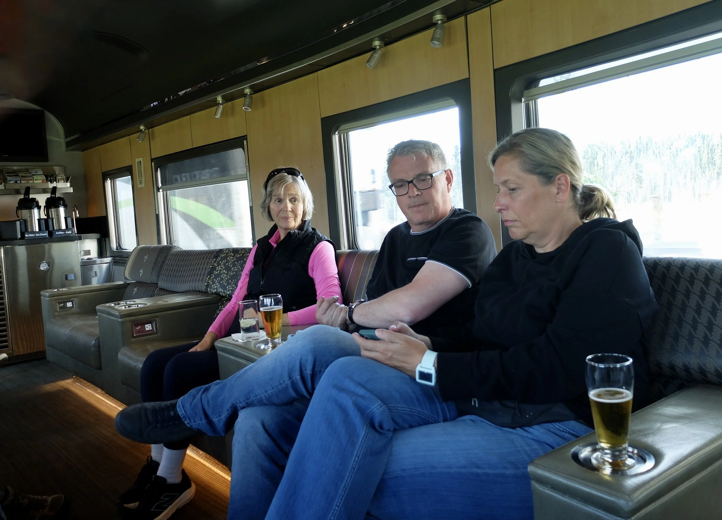  After 5:00 we were allowed to enter the “Prestige” lounge in the last car.  The German couple were really nice.  They were spending months traveling around.  The woman in pink sleeves was a “prestige” traveler whose annoying, conservative, heavy int