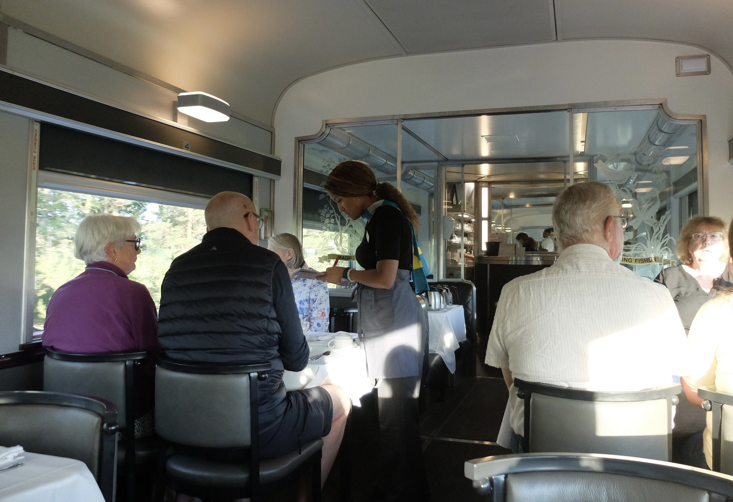  The dining car folks served three meals in three sittings per day.  All the meals had several choices &amp; were delicious.  That’s 24 four tops or 96 folks for each sitting, six times/day. 