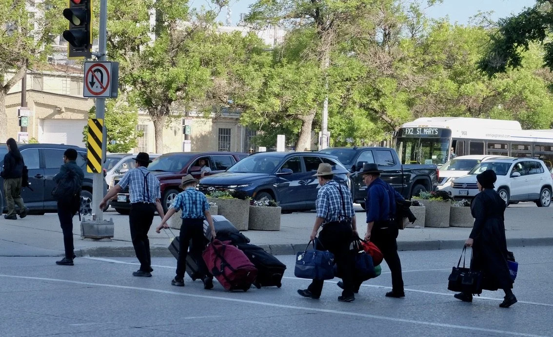  Mennonite family outside the Winnipeg Union Station.  