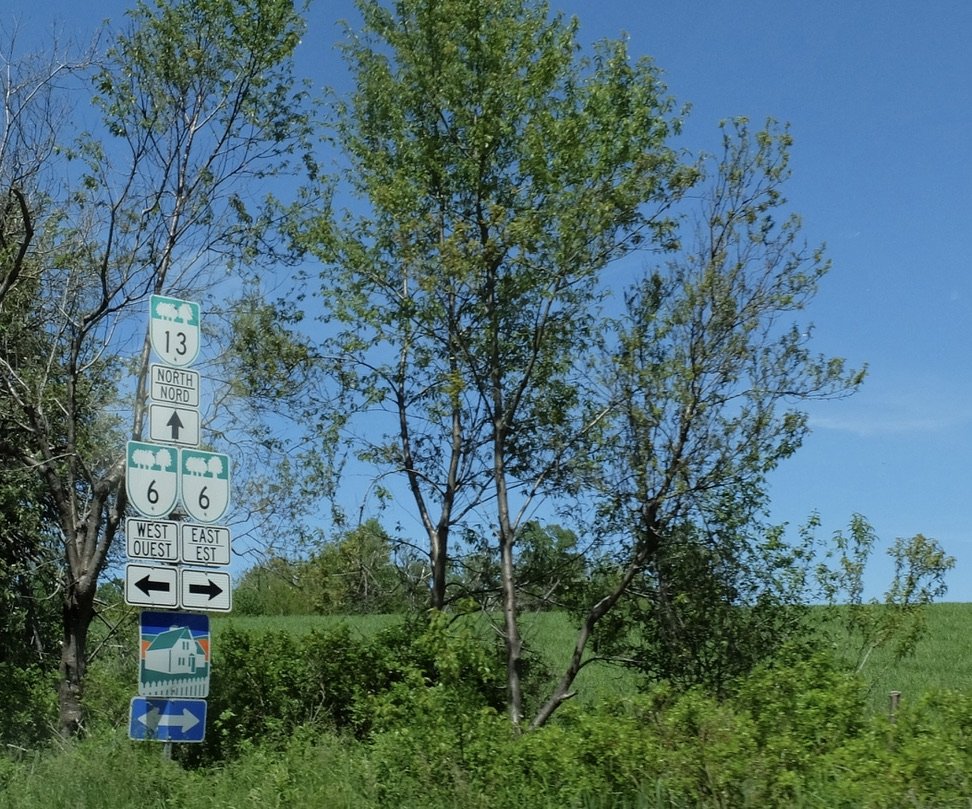  Best of Prince Edward Island Tour.  Note Green Gables Heritage Place sign. It’s a big tourist draw here. Best of Prince Edward Island Tour. 