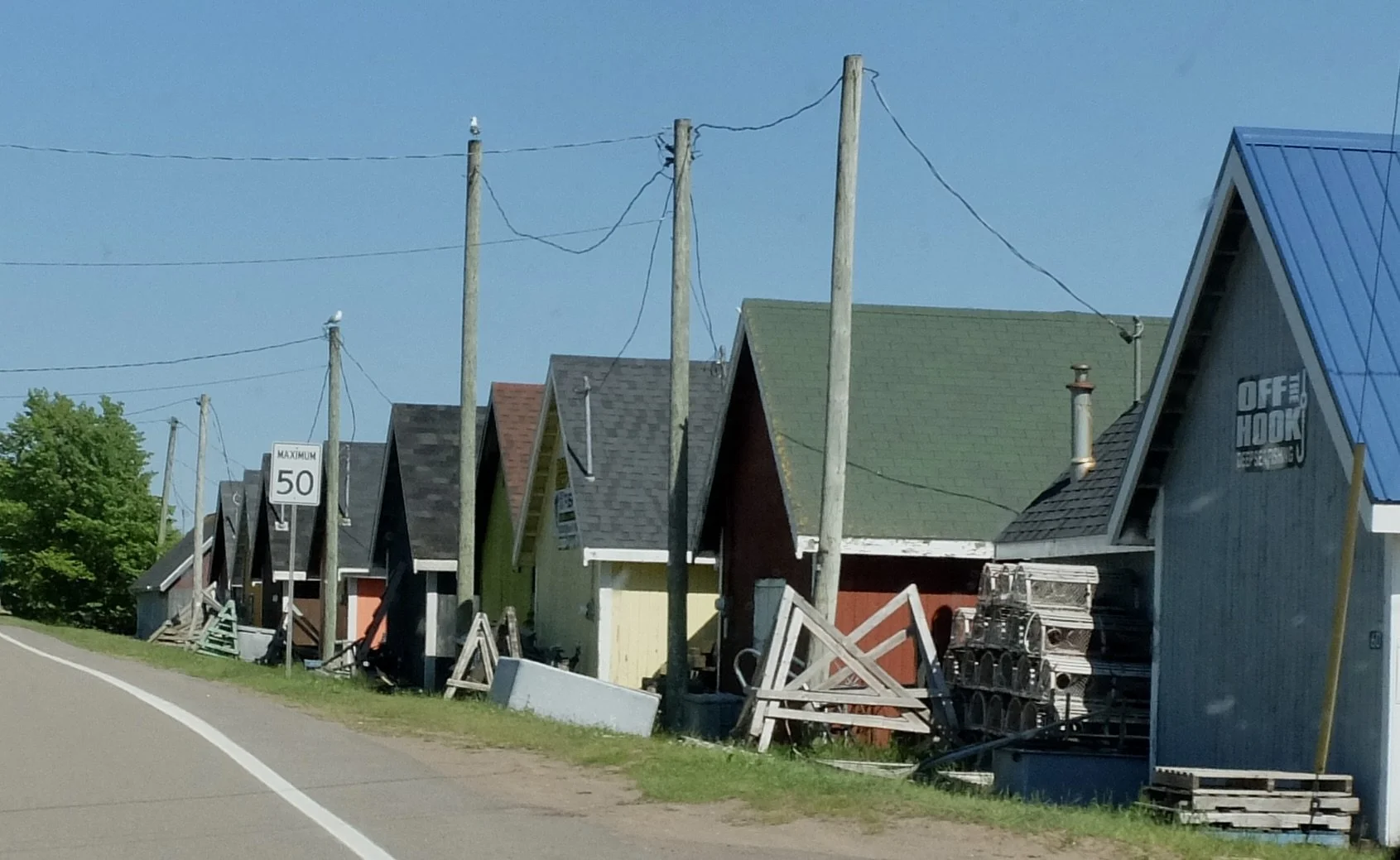  “OFF THE HOOK - Deep Sea Fishing”  I really wanted to see the other side of the building but I was not the only one in the van &amp;  I didn’t think our driver/guide would be accommodating.  He seemed to be in a rush.  Cape Turner (North Rustico, PE