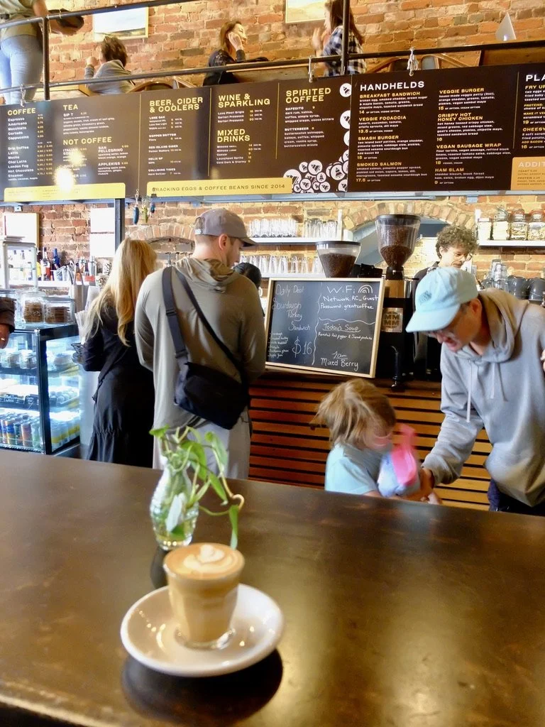  "Cracking eggs &amp; coffee beans since 2014"   &amp;   "Handhelds"   at The Gallery Coffee House &amp; Bistro, Charlottetown, PEI.  
