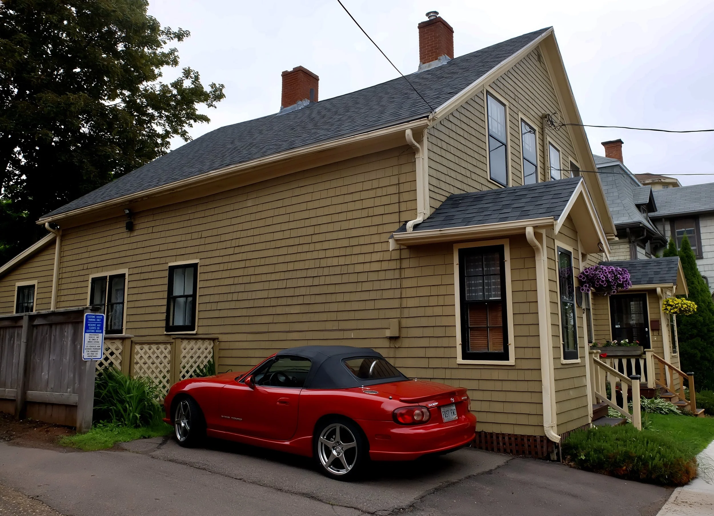  Great George Street Historic District, Charlottetown, PEI.  To be looking so good this Mazda Miata must be an out of town tourist or kept here in an environmentally sealed garage. 