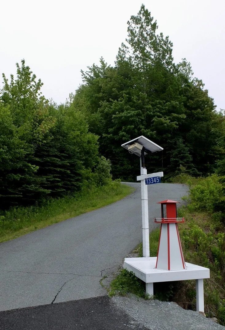  Road to Peggy's Cove - This lighthouse is a recurring motif in the Maritimes. 