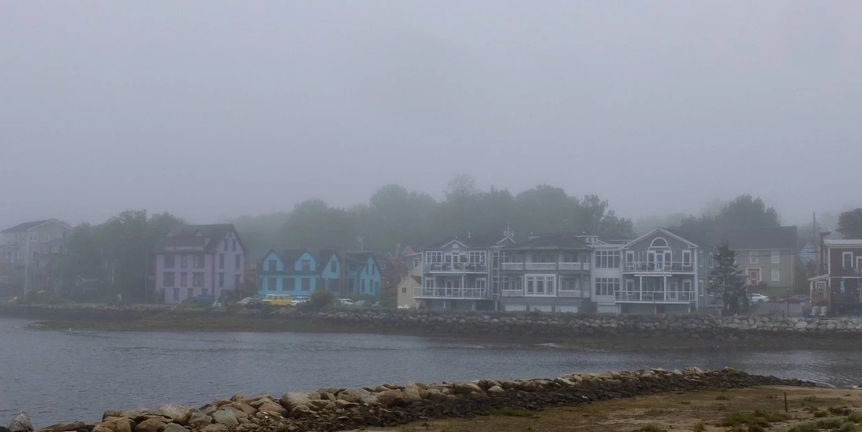  Peggy's Cove, Nova Scotia.   Later the fog lifted like a theatre curtain going up. 
