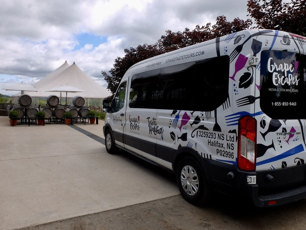  JD’s van at Benjamin Bridges Winery, Wolfville, Nova Scotia.  My healing leg permitted me to be in the shotgun seat &amp; get some reasonably good photos through his clean windshield.  
