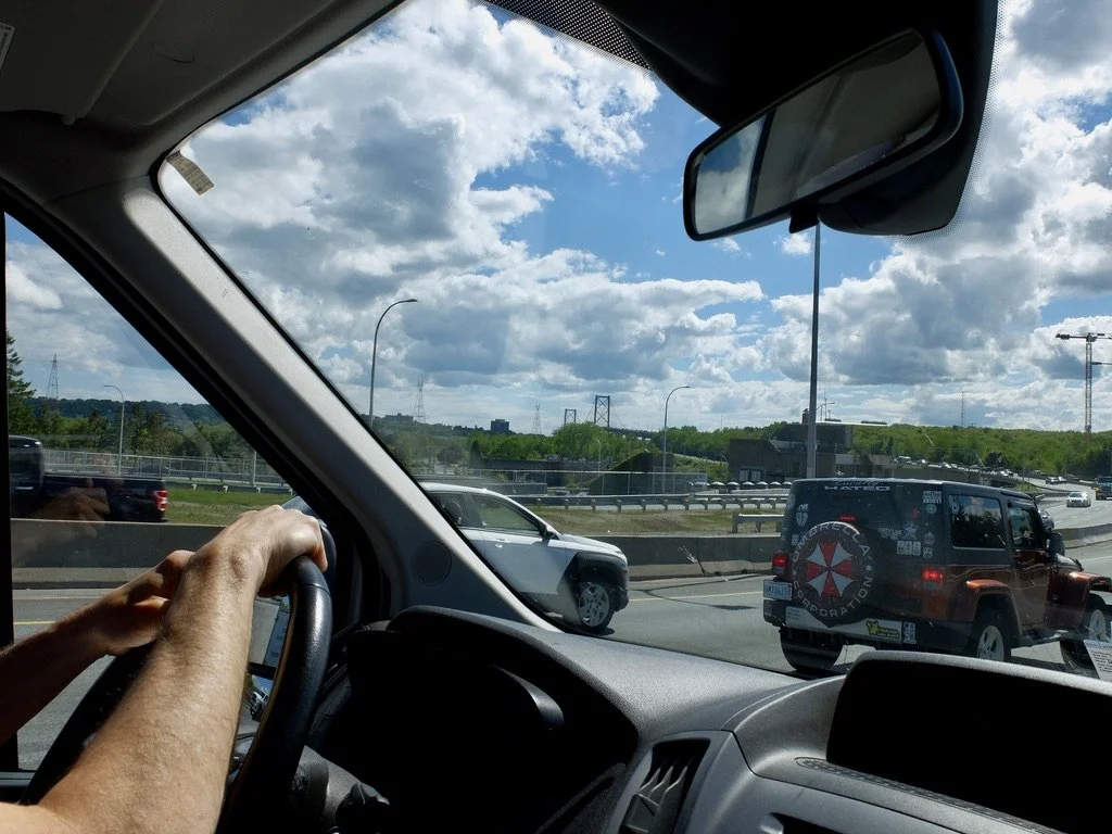  Approaching the MacKay Bridge into Halifax in heavy traffic.  But, it was moving along. 